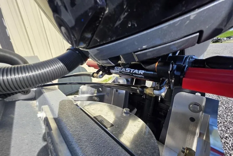 Slide: The Image of 2026 Xpress H24B Bay boat with SeaStar hydraulic steering system. - 7