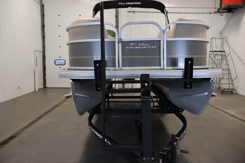 Slide: The Image of 2023 Sun Tracker Party Barge 18 DLX pontoon boat in a garage setting. - 39