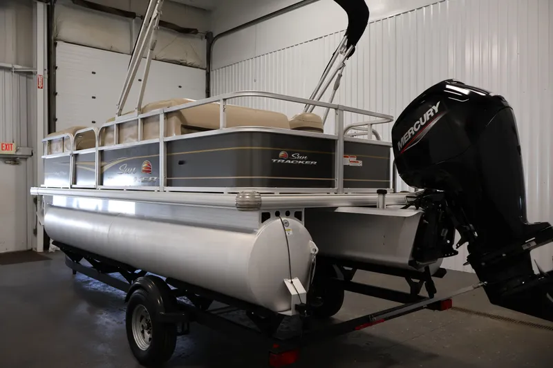 Slide: The Image of 2023 Sun Tracker Party Barge 18 DLX pontoon boat with Mercury outboard motor. - 7