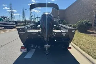 Slide: The Image of 2023 Tracker Targa V-19 WT boat on trailer, rear view, outdoors. - 3