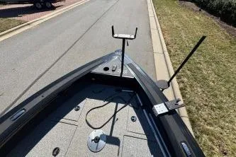 Slide: The Image of 2023 Tracker Targa V-19 WT boat on a road, showing bow and deck features. - 6