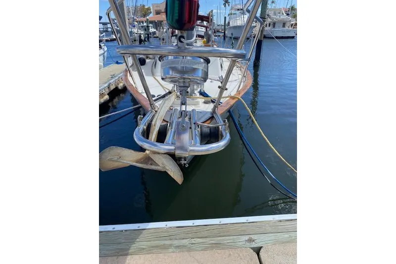 Slide: The Image of 1995 Pacific Seacraft Crealock 34 sailboat anchored at marina dock. - 2