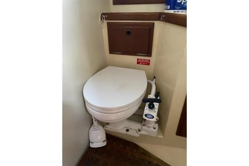 Slide: The Image of Toilet in 1995 Pacific Seacraft Crealock 34 sailboat bathroom. - 21