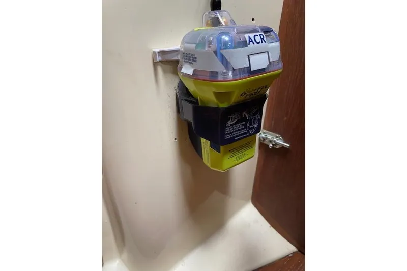 Slide: The Image of Emergency beacon mounted on 1995 Pacific Seacraft Crealock 34 sailboat interior. - 25