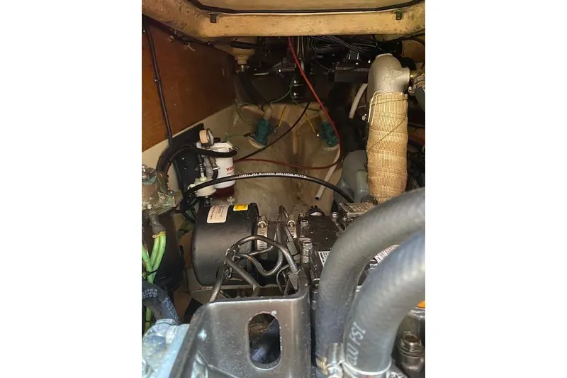 Slide: The Image of Engine compartment of 1995 Pacific Seacraft Crealock 34 sailboat, showing mechanical components. - 34