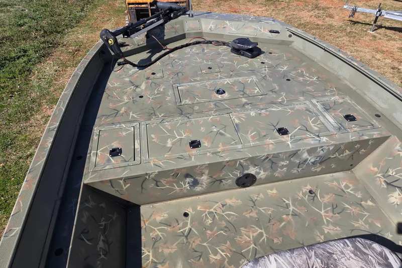 Slide: The Image of 2022 Tracker Grizzly 2072 CC boat with camouflage deck design. - 13