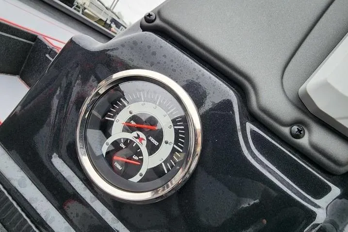 Slide: The Image of Close-up of 2025 Xpress H20 Bass boat dashboard with tachometer gauge. - 13