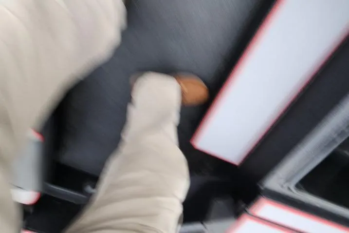 Slide: The Image of Blurry view of person stepping on 2025 Xpress H20 Bass boat deck. - 15