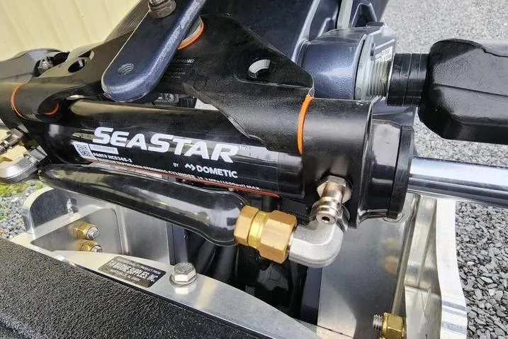 Slide: The Image of Hydraulic steering system on 2025 Xpress H20 Bass boat, featuring SeaStar by Dometic. - 21