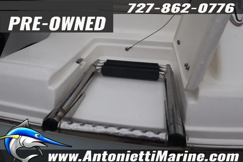 Slide: The Image of Pre-owned 2017 Robalo R200 Center Console boat ladder, Antonietti Marine contact details. - 9