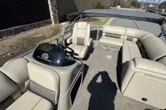 Slide: The Image of 2021 Sun Tracker Party Barge 20 DLX with spacious seating and modern helm. - 7