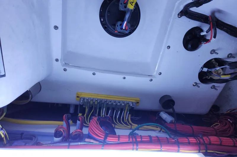 Slide: The Image of Electrical wiring setup in a 2021 Mag Bay 33 CC boat. - 100