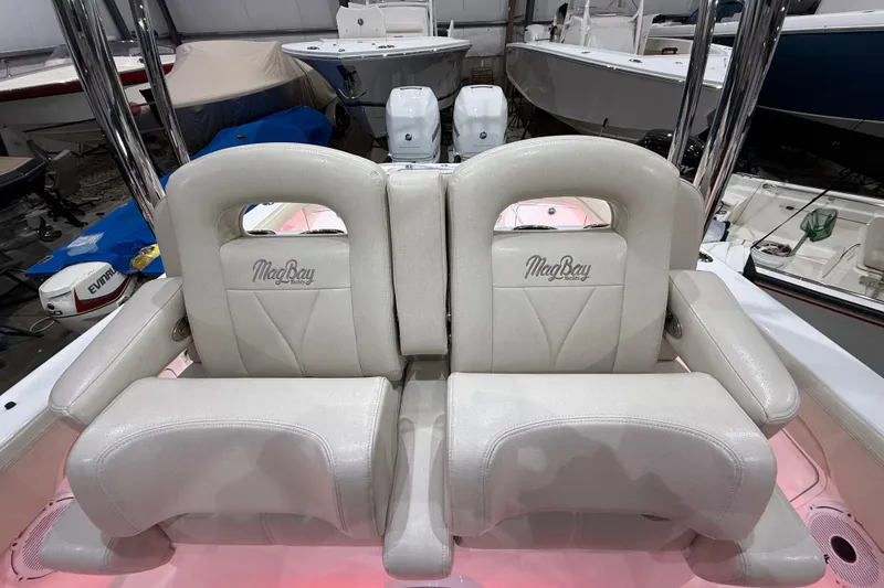 Slide: The Image of 2021 Mag Bay 33 CC boat interior with lights and speakers. - 31