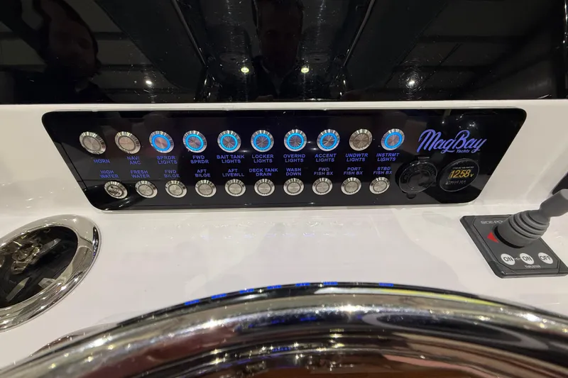 Slide: The Image of 2021 Mag Bay 33 CC boat interior with speaker and lighting fixtures. - 36