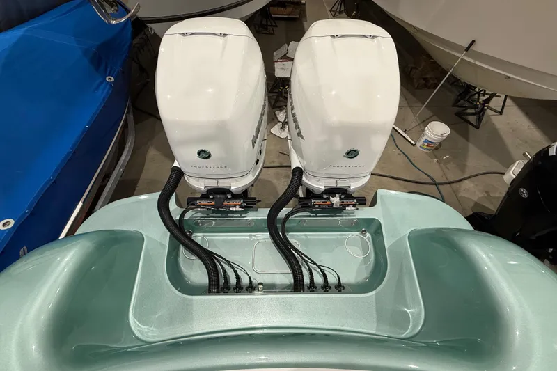 Slide: The Image of 2021 Mag Bay 33 CC boat interior with modern console and lighting. - 54