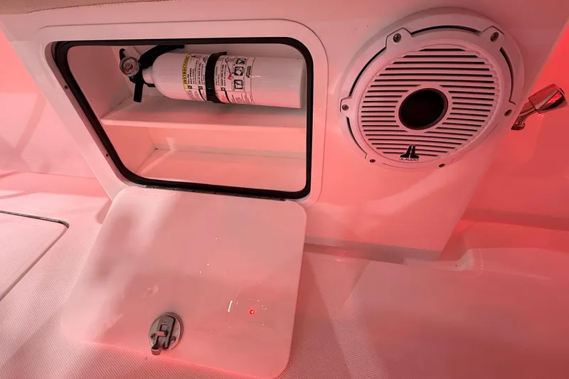 Slide: The Image of Engine compartment of 2021 Mag Bay 33 CC boat, showcasing pumps and plumbing components. - 59