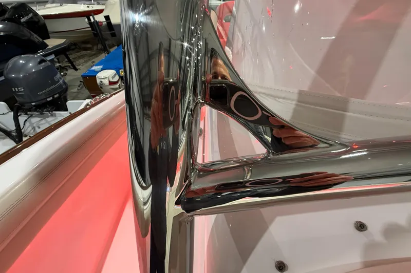 Slide: The Image of Open storage compartment on 2021 Mag Bay 33 CC boat with ropes and fender. - 67