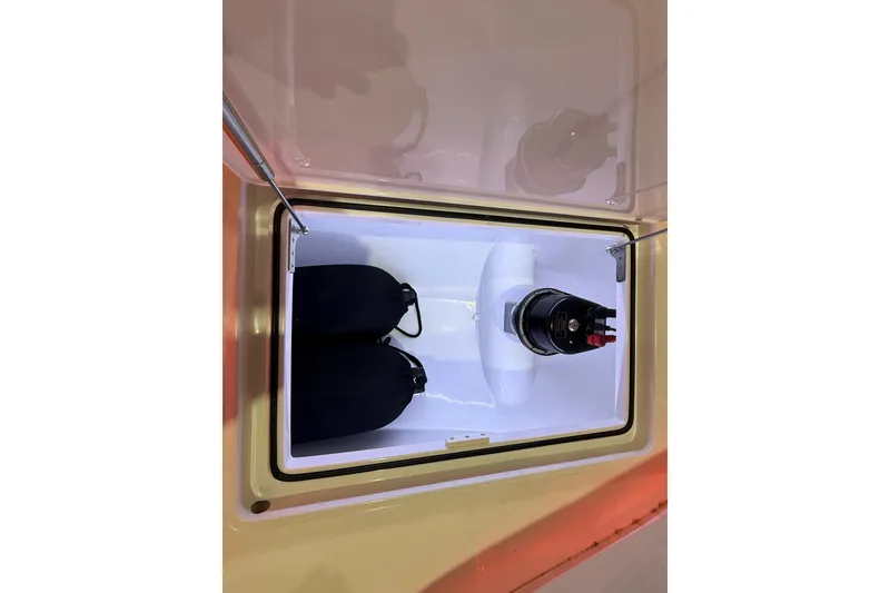 Slide: The Image of 2021 Mag Bay 33 CC boat interior with red LED lighting and sleek design. - 77