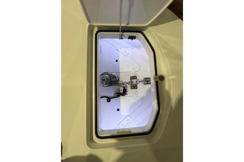 Slide: The Image of 2021 Mag Bay 33 CC boat interior with red LED lighting and speaker. - 80