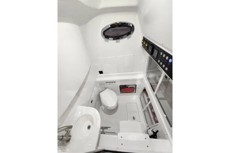 Slide: The Image of Luxurious seating area on 2021 Mag Bay 33 CC boat with ambient lighting. - 84