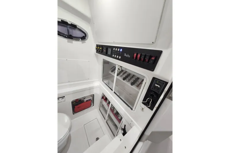 Slide: The Image of Interior view of 2021 Mag Bay 33 CC boat with ambient lighting. - 85