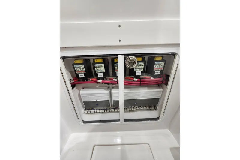 Slide: The Image of Electrical panel of 2021 Mag Bay 33 CC boat with wiring and components. - 96