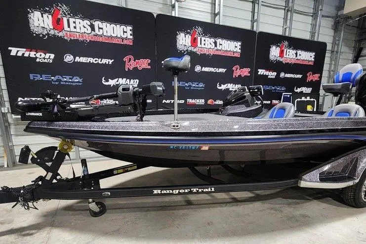 Slide: The Image of 2024 Ranger Z519 boat on trailer at Anglers Choice event display. - 4