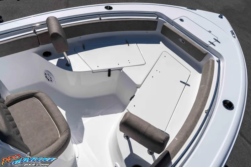 Slide: The Image of 2026 Sea Hunt Ultra 229 boat interior with seating and storage compartments. - 19