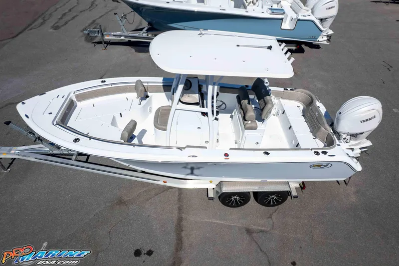 Slide: The Image of 2026 Sea Hunt Ultra 229 boat on trailer, featuring Yamaha engine, top view. - 34