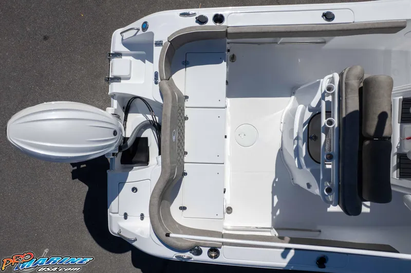 Slide: The Image of Top view of 2026 Sea Hunt Ultra 229 boat interior with seating and motor. - 47