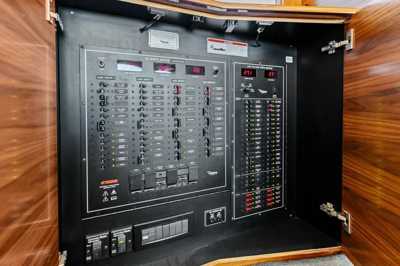 Slide: The Image of Electrical control panel inside 2023 Vikiing convertible, featuring switches and digital displays. - 15