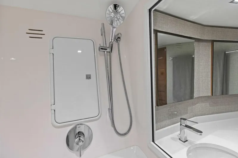 Slide: The Image of Modern bathroom in 2023 Vikiing convertible with sleek shower and faucet design. - 26