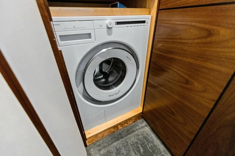 Slide: The Image of Front-loading washing machine in a wooden cabinet, 2023 Vikiing convertible model. - 30