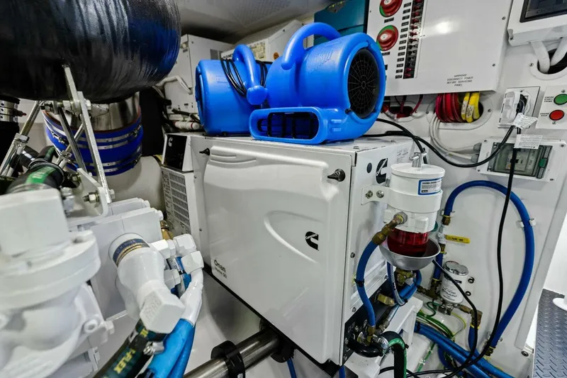 Slide: The Image of Engine room of 2023 Vikiing convertible with Cummins generator and blue air mover. - 60