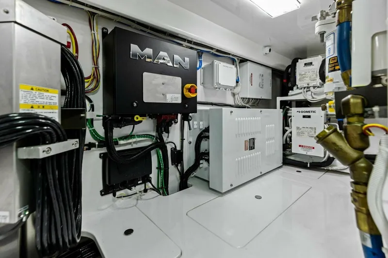 Slide: The Image of Engine room of 2023 Vikiing convertible yacht with MAN and Dometic equipment. - 63