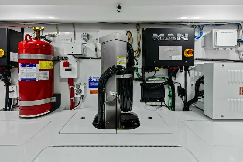 Slide: The Image of Engine room of 2023 Vikiing convertible with fire extinguisher and control systems. - 64
