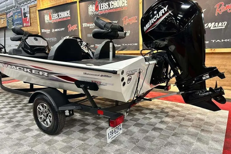 Slide: The Image of 2019 Tracker Pro Team 175 TXW Tournament Edition boat with Mercury engine on display. - 5