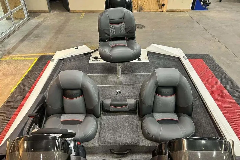 Slide: The Image of 2019 Tracker Pro Team 175 TXW Tournament Edition boat interior with three gray seats. - 8