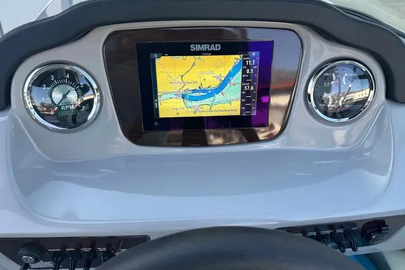 Slide: The Image of Dashboard of 2022 Chapparall 21 SSi boat with Simrad navigation display. - 6