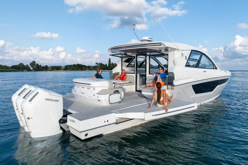 The Image of 2026 Cruisers Yachts 50 GLS on water, featuring spacious deck and modern design. - 0