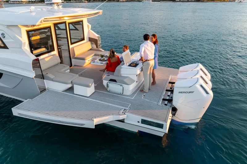 Slide: The Image of Luxurious interior of 2026 Cruisers Yachts 50 GLS with modern wood finish and cozy bedroom. - 29