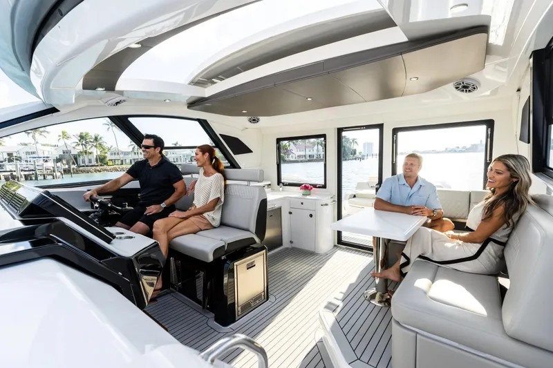 Slide: The Image of Luxurious interior of 2026 Cruisers Yachts 50 GLS with wood paneling and skylight. - 33