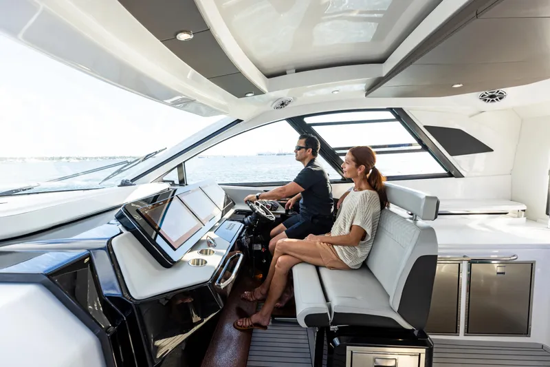 Slide: The Image of Luxurious bathroom in 2026 Cruisers Yachts 50 GLS with modern fixtures and wood paneling. - 38