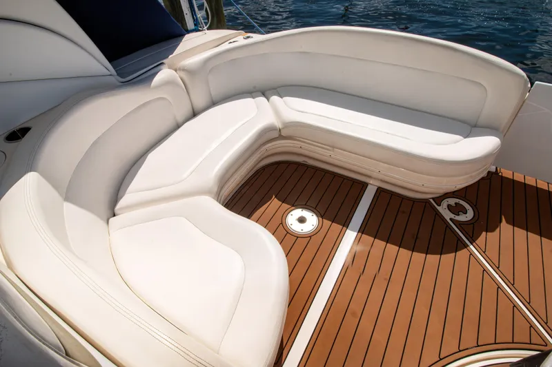 Slide: The Image of Luxurious seating on 2006 Sea Ray Sundancer 320 yacht with elegant wooden deck. - 24