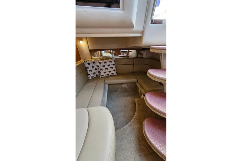 Slide: The Image of Interior of 2006 Sea Ray Sundancer 320, featuring cozy seating and stylish decor. - 38