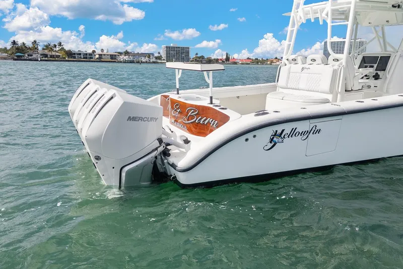 Slide: The Image of 2015 Yellowfin 39 Offshore boat with Mercury engines on clear water. - 5
