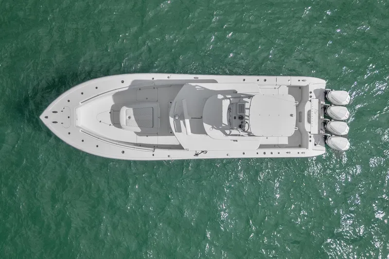 Slide: The Image of Overhead view of 2015 Yellowfin 39 Offshore boat on green water. - 8