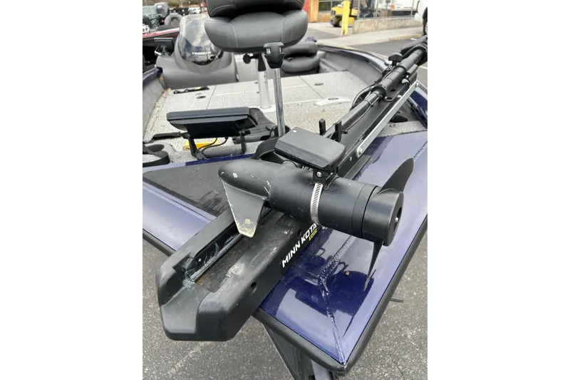 Slide: The Image of 2021 Bass Tracker Pro 17 boat with Minn Kota trolling motor on deck. - 5