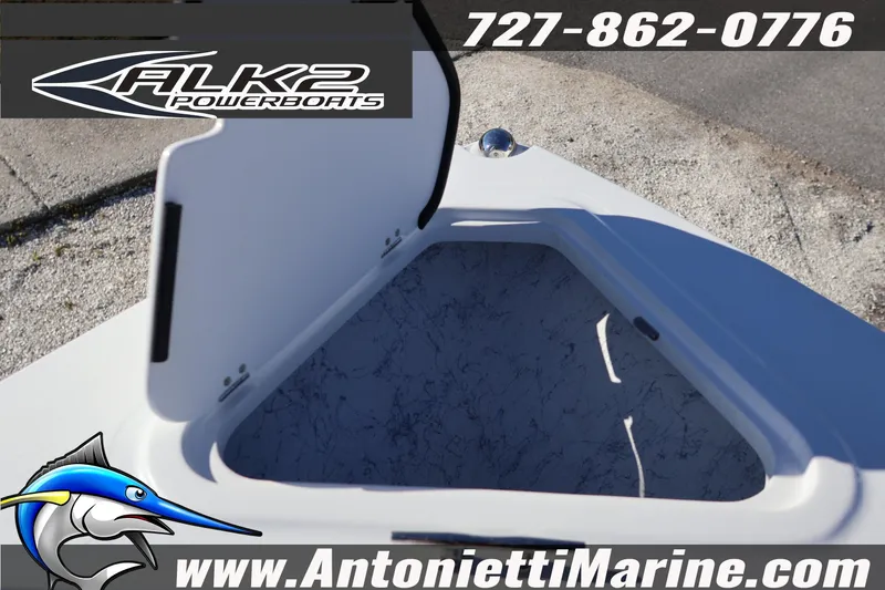 Slide: The Image of Open storage compartment on 2026 ALK2 Powerboats 23 CRX, with contact details and logo. - 15