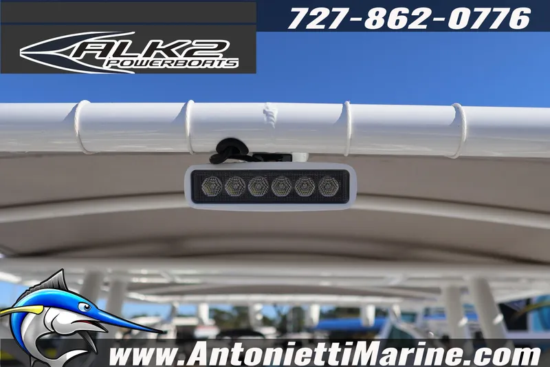 Slide: The Image of 2026 ALK2 Powerboats 23 CRX canopy with LED light, Antonietti Marine branding. - 18